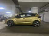 side profile of a High Street Gold Tata Altroz 2020-2024
