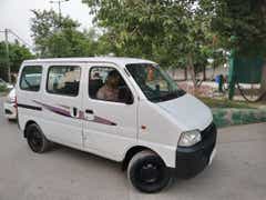 side view of a Solid White Maruti Suzuki Eeco