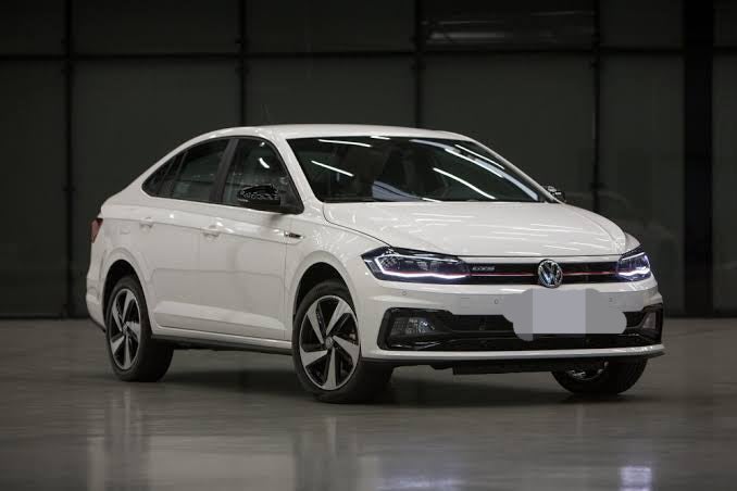 front three-quarter view of a Candy White Volkswagen Virtus