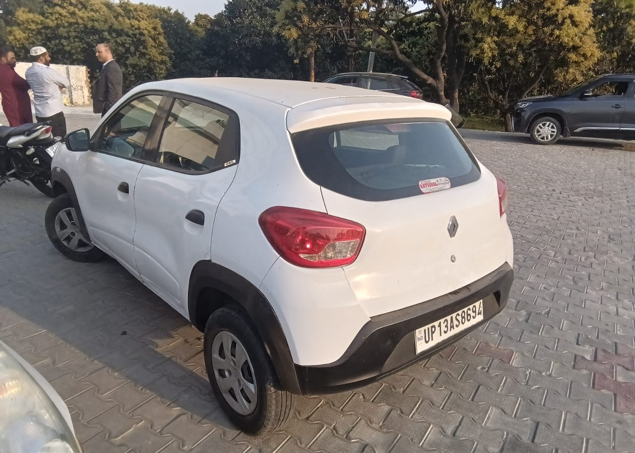 rear three-quarter view of a Renault KWID