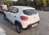 rear three-quarter view of a Renault KWID