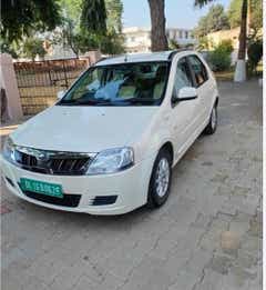 front three-quarter view of a Diamond White Mahindra E Verito