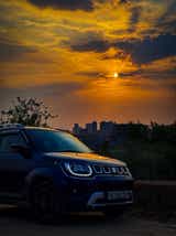 front three-quarter of a Maruti Suzuki Ignis at sunset