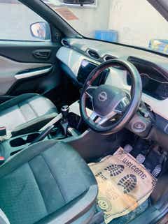 interior dashboard and front seats of a Nissan Magnite