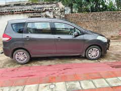 side view of a Magma Grey Maruti Suzuki Ertiga
