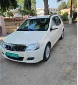 Front three-quarter view of a Diamond White Mahindra E Verito