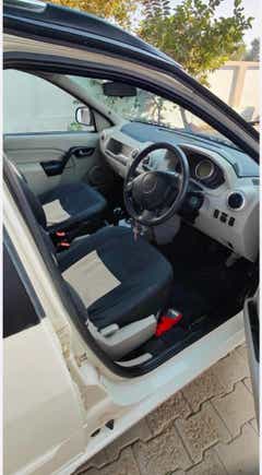 Interior front seats and dashboard of a Mahindra E Verito