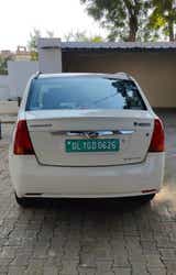 Rear view of a Diamond White Mahindra E Verito