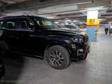 front three-quarter view of a Napoli Black Mahindra Scorpio-N