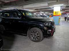 front three-quarter view of a Napoli Black Mahindra Scorpio-N