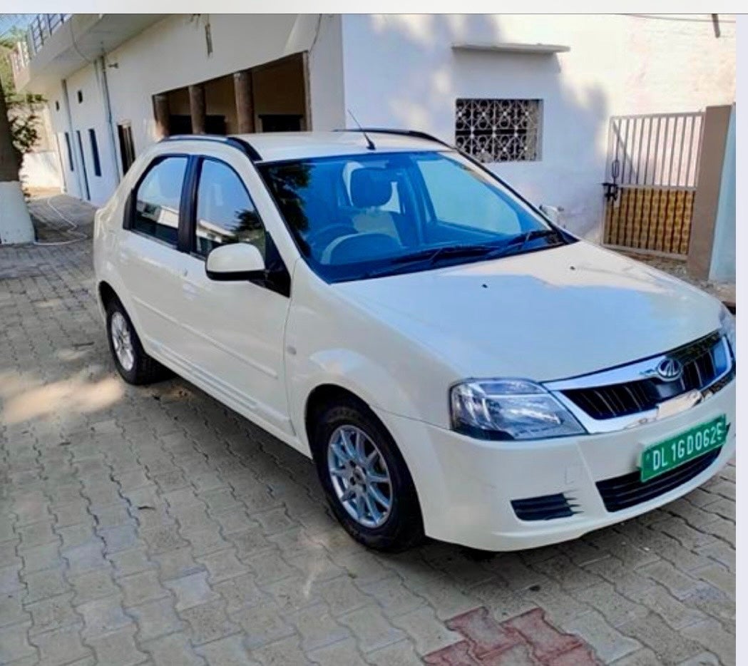 Front three-quarter view of a Diamond White Mahindra E Verito