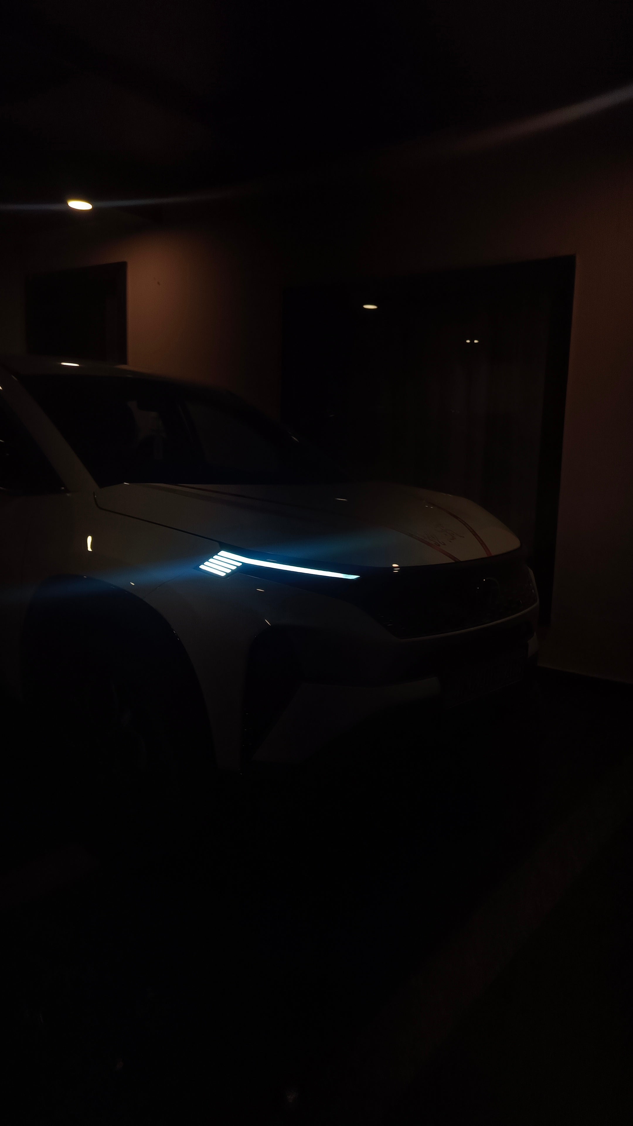 Headlight close-up of a Tata Curvv