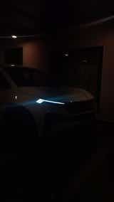 Headlight close-up of a Tata Curvv