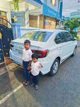 rear three-quarter of a Honda Amaze