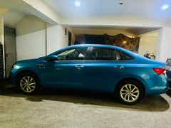 side view of a Crystal Blue Skoda Slavia