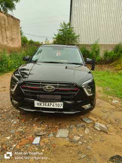 front view of a Abyss Black Hyundai Creta