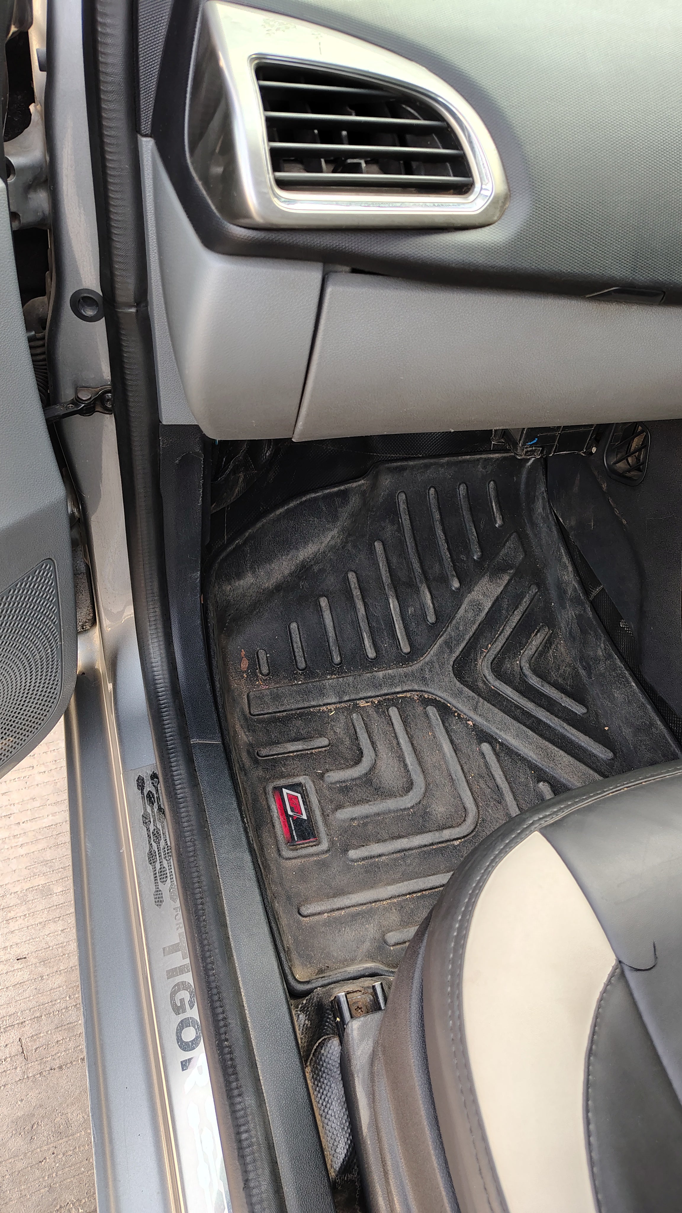 Front passenger footwell and door sill of a Tata Tigor