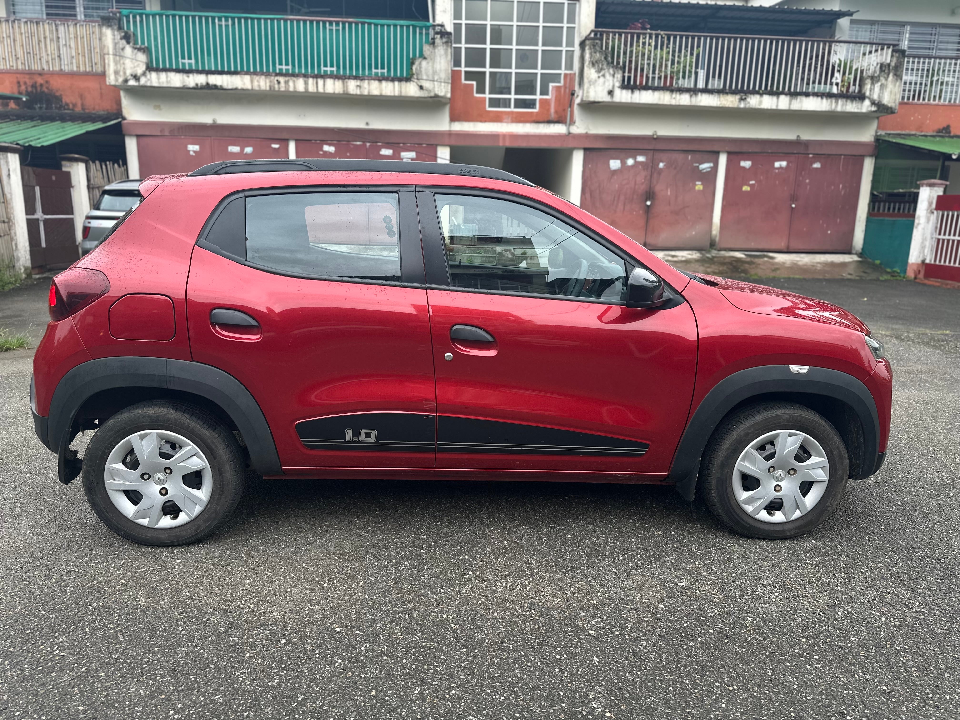 side view of a Fiery Red Renault KWID