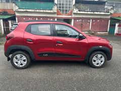 side view of a Fiery Red Renault KWID