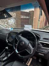 Interior dashboard and steering wheel of a MG Hector