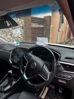 Interior dashboard and steering wheel of a MG Hector