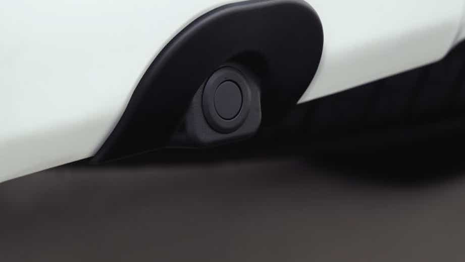 Close-up of parking sensor on a Isuzu S-CAB