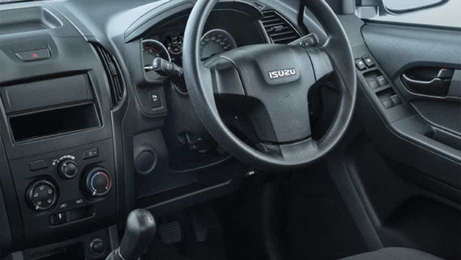 dashboard and steering wheel interior of an Isuzu S-CAB