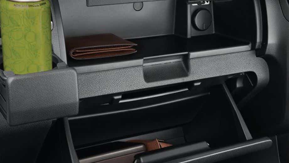 Dashboard storage compartments of a Isuzu S-CAB