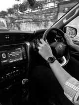 Interior dashboard and steering wheel of a Toyota Fortuner