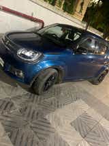front three-quarter view of a Nexa Blue Maruti Suzuki Ignis