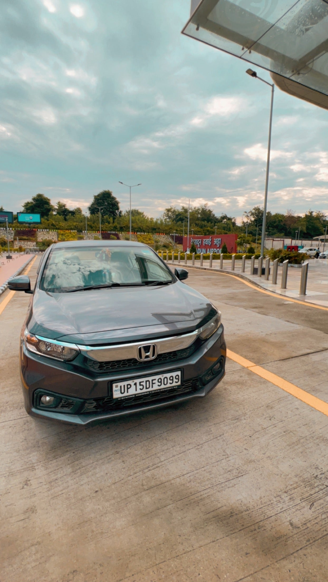 Front view of a Honda Amaze 2022-2023 at Dehradun Airport
