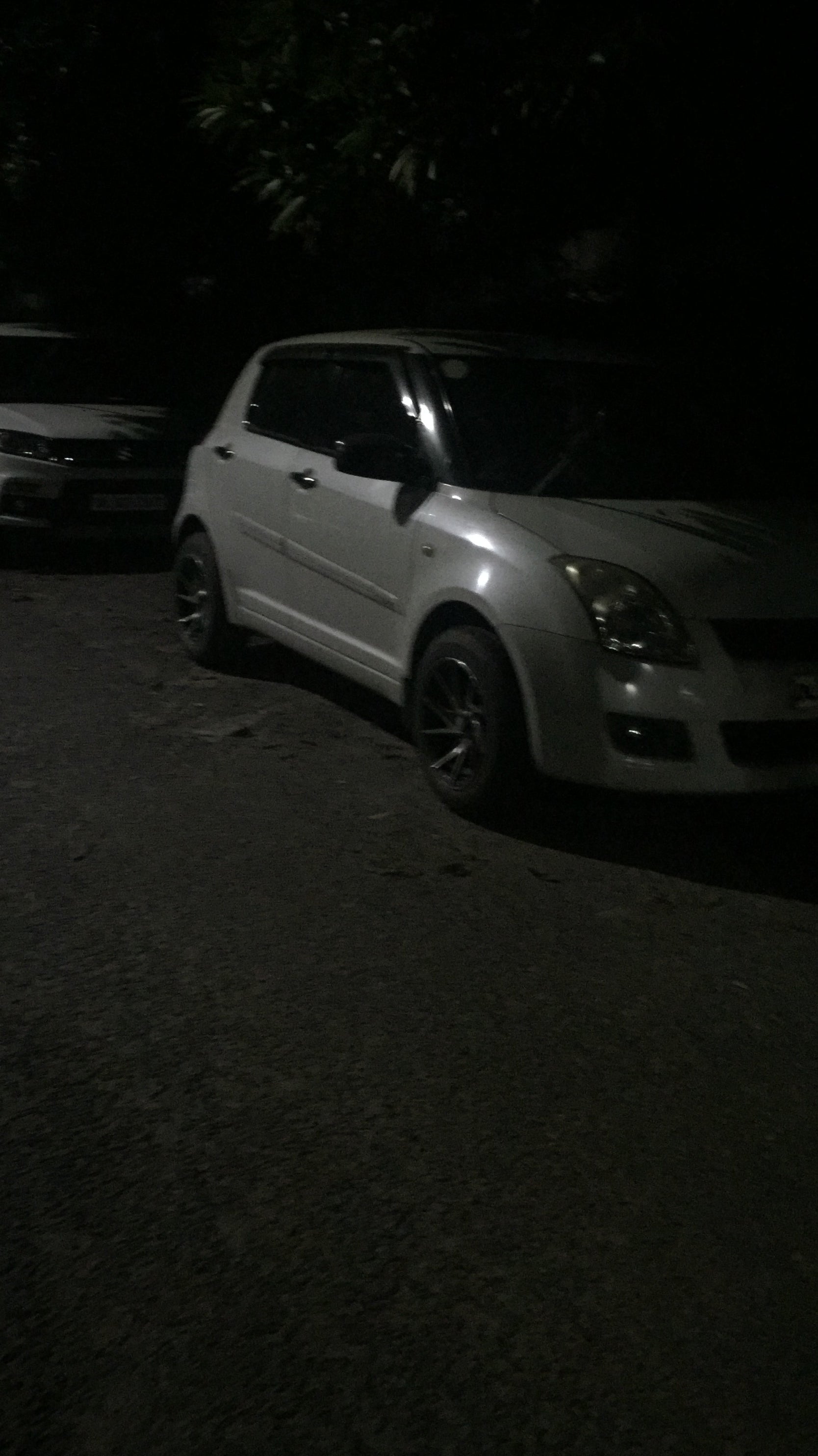 front three-quarter of a Maruti Suzuki Swift 2021 - 2023