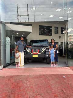front view of a Mahindra Thar at dealership