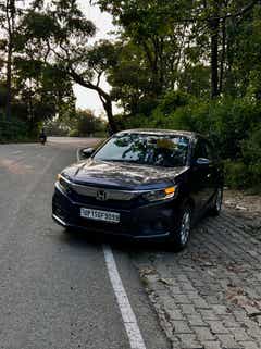 front view of a Honda Amaze 2022-2023 parked on roadside