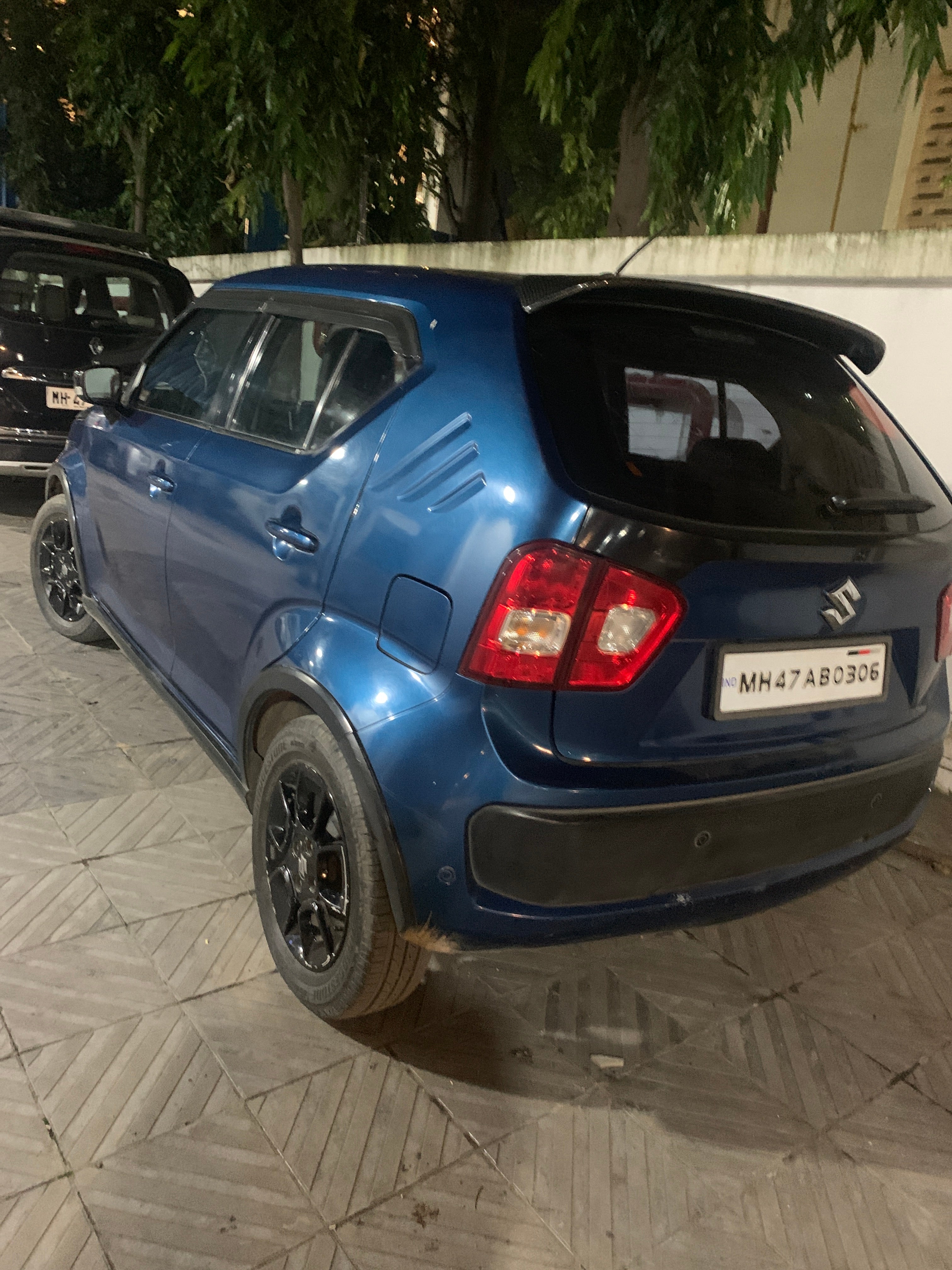 rear three-quarter of a Nexa Blue Maruti Suzuki Ignis