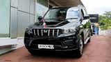 Front view of a Napoli Black Mahindra Scorpio-N