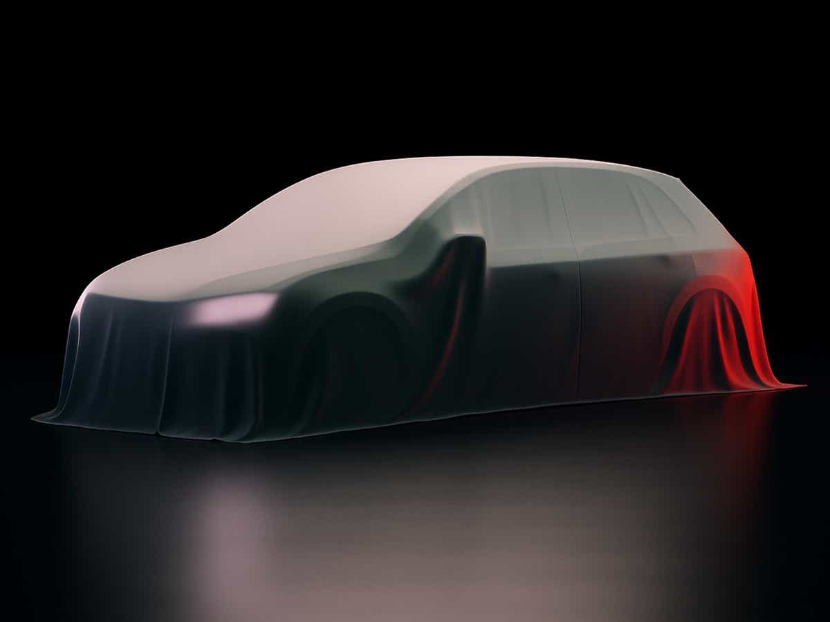 full-car view of a Toyota Yaris Hatchback under cover