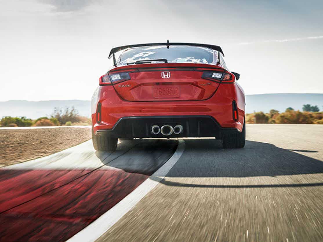 Rear view of a Honda Civic Type R on a racetrack