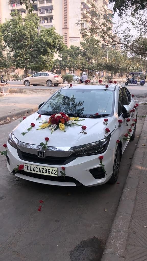 front view of a Honda City decorated for an event