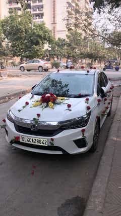 front view of a Honda City decorated for an event