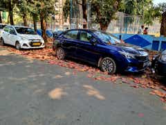 side view of a Honda City parked on a street
