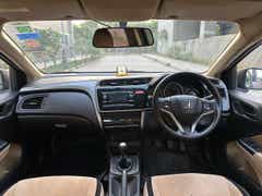 interior dashboard and steering view of a Honda City