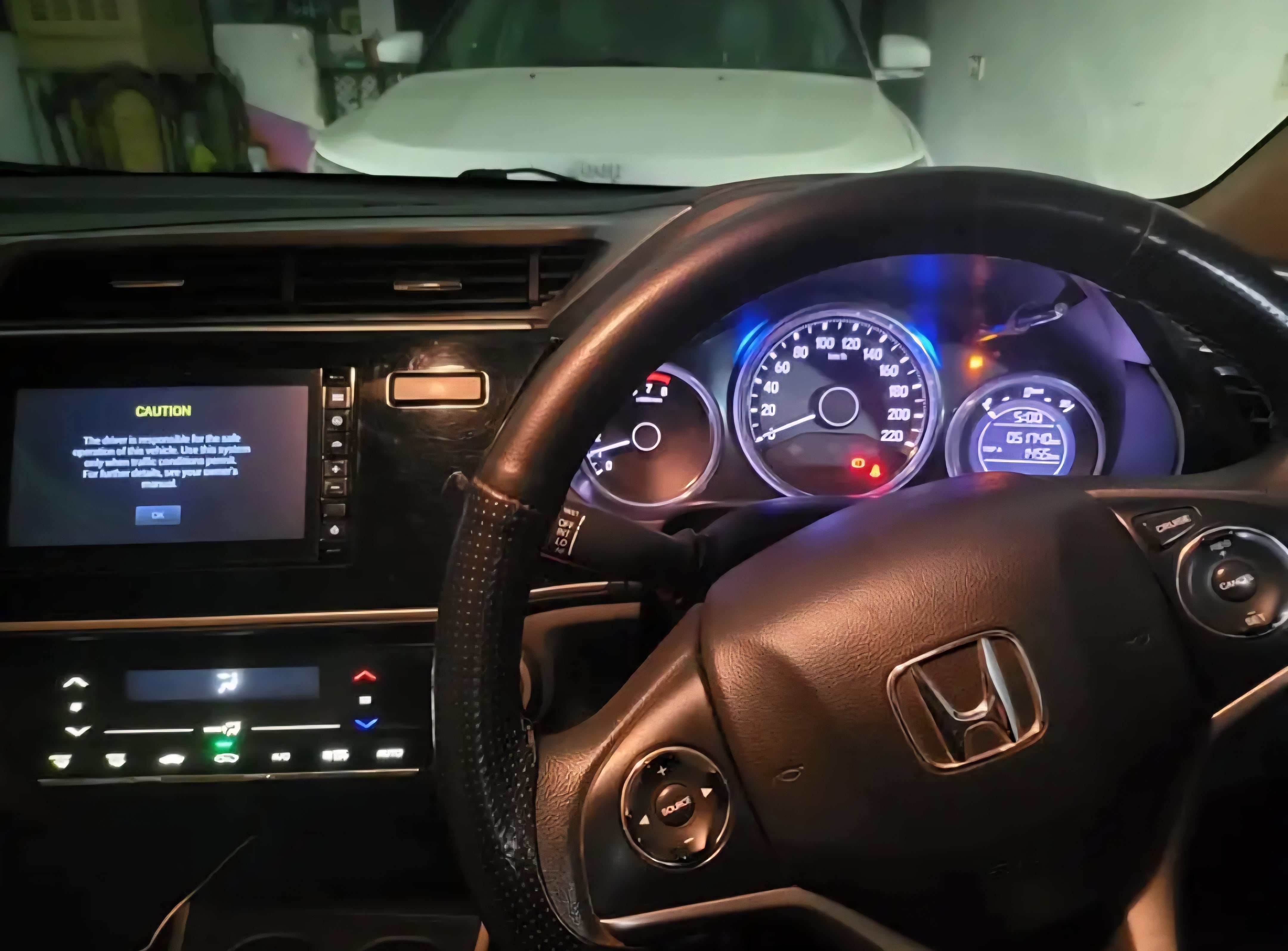 Dashboard and steering wheel view of a Honda City