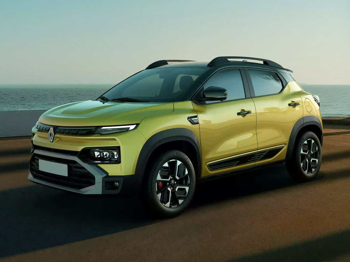 front three-quarter view of a Oasis yellow Renault Kiger
