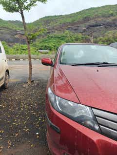 Front-left view of a Honda City parked outdoors