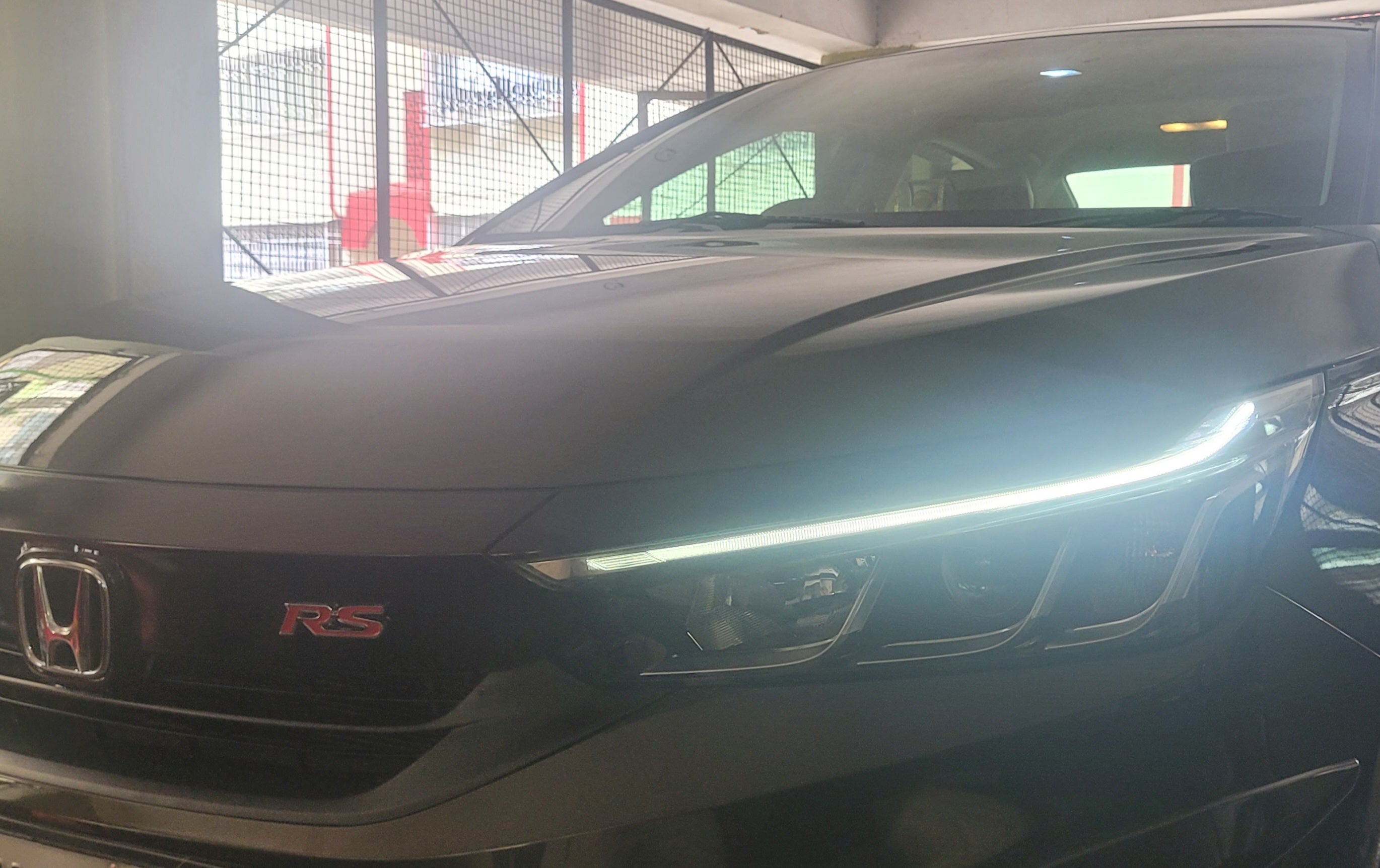 Front headlight and grille of a Honda City RS