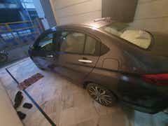 rear three-quarter view of a Honda City