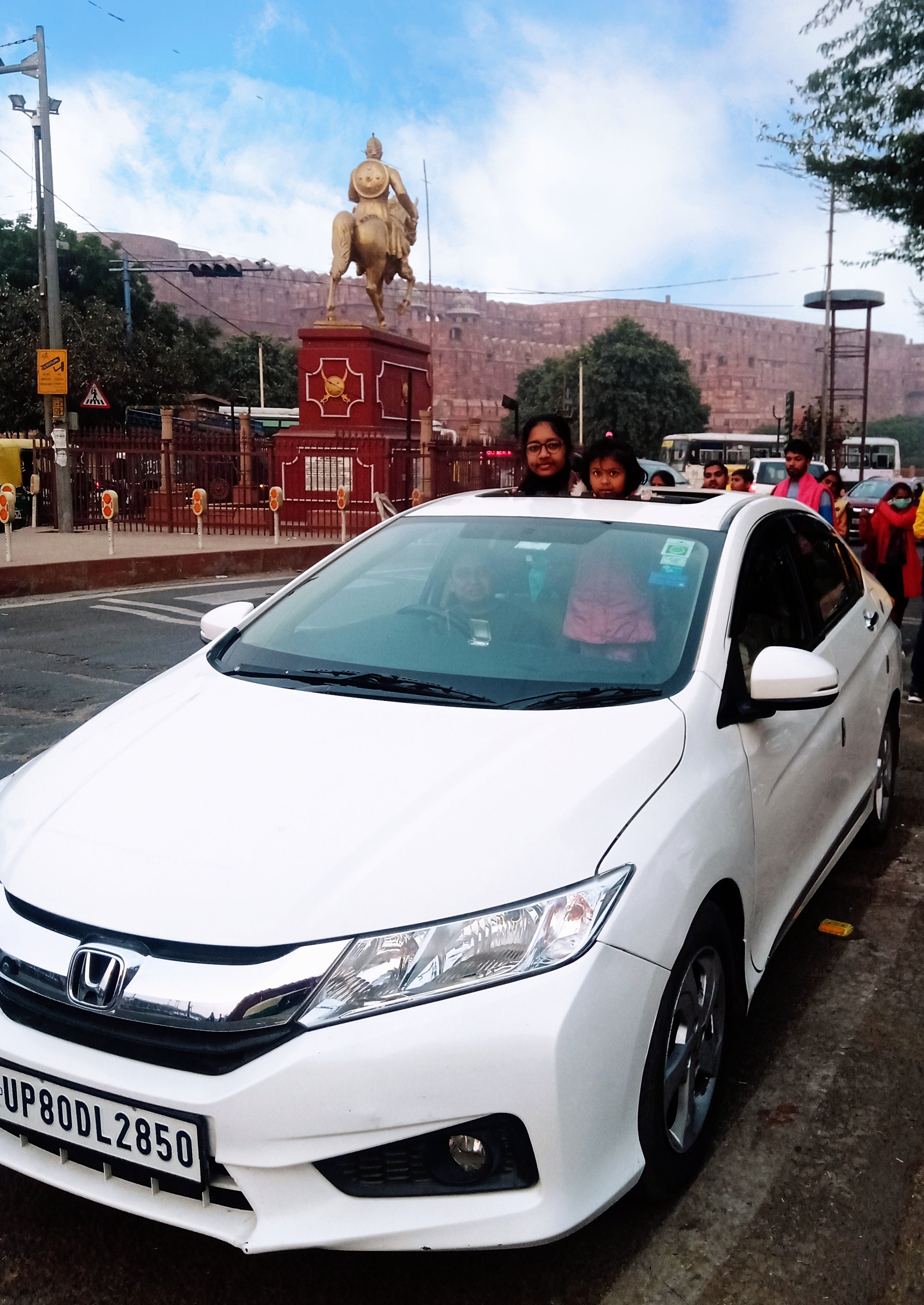 front view of a Honda City parked on the street