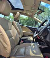 interior front seats and dashboard of a Honda City