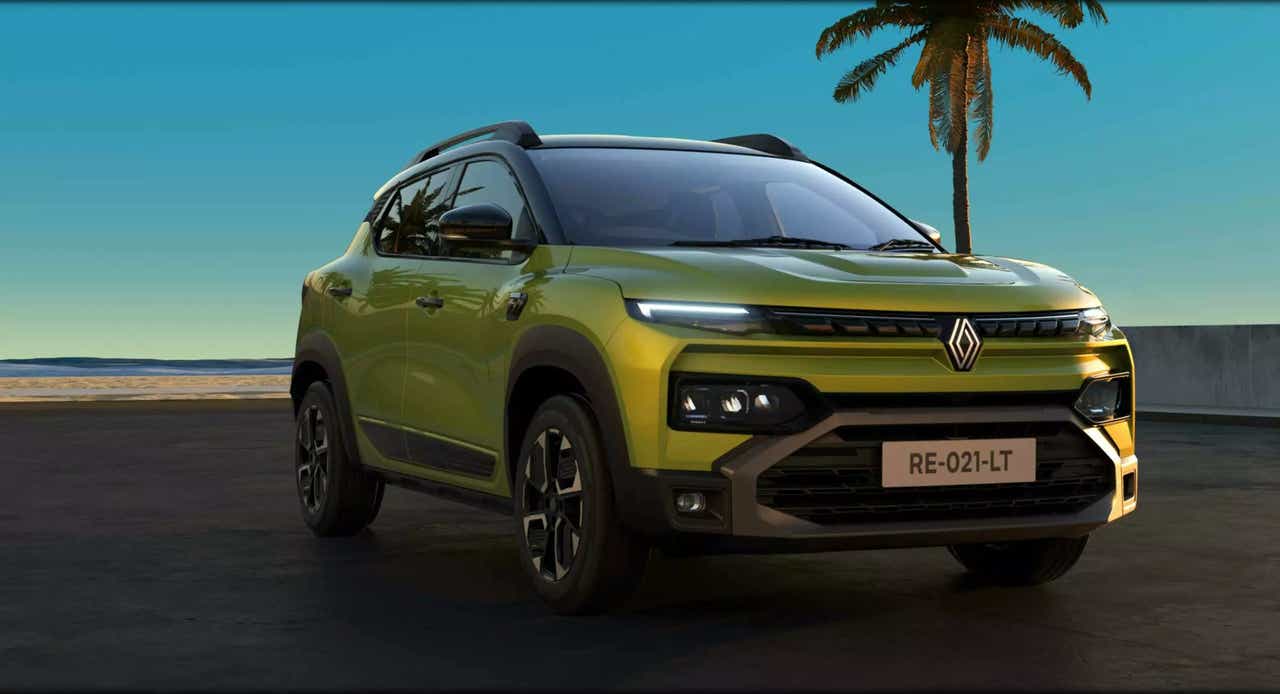 front three-quarter view of a Oasis yellow Renault Kiger